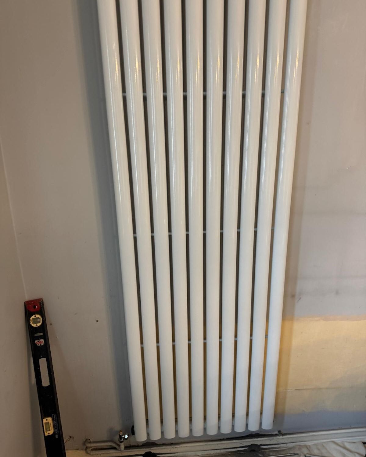 Vertical designer radiator installed by Hammond Plumbing and Heating
