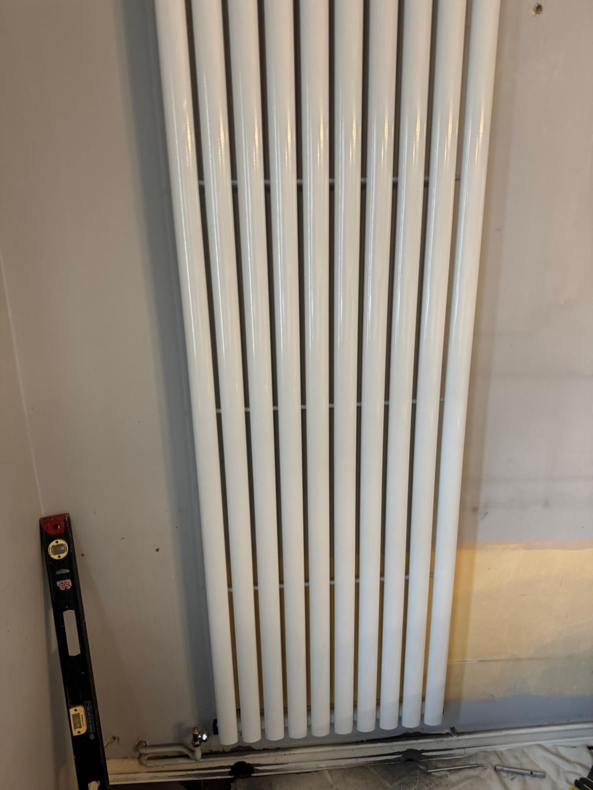 Vertical designer radiator fitted